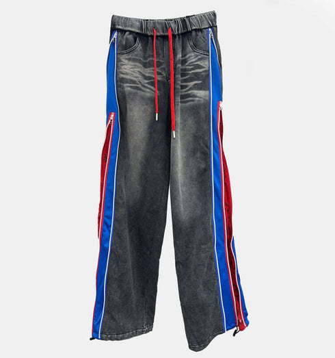 טרנינג פוטר טרנדי בגוון אפור עם פסים כחול ואדום, סגירת רוכסן, שיפשוף ווינטג' ונוחות.