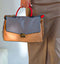 Stylish Italian two-tone handbag in gray and beige with colorful accents, perfect for daily use and special events.