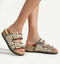 Stylish cork sandals adorned with beads and shells, featuring gold buckles for a chic summer look.