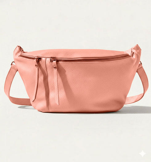 פאוץ' עור איטלקי מובחר בגוון ורוד, עם רצועת עור תואמת