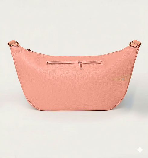 פאוץ' עור איטלקי מובחר בגוון ורוד, עם רצועת עור תואמת