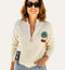 קרדיגן כותנת צמר עם לייקרה בגוון לבן, עם פצ'ים, סמלים וכיסים. .