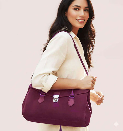 תיק מעצבים סגול מעור ז'אמש מובחר, קלאסי ונשי עם ידיות ארוכות ואבזם כסוף.