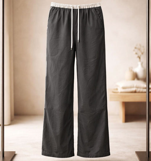 מכנס ניילון-כותנה קליל בגוון אפור, עם כיסים וגומי במותניים